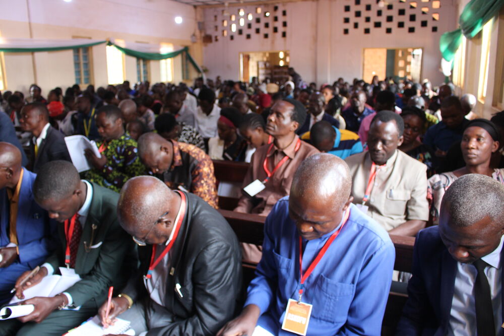 Attendees taking notes at the Kenya Disciple Makers Conference