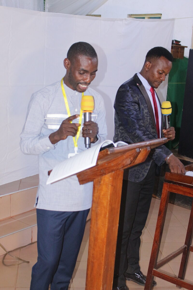 Leaders addressing attendees at the podium, Kenya Disciple Makers Conference